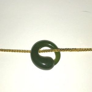 Green lucite like charm